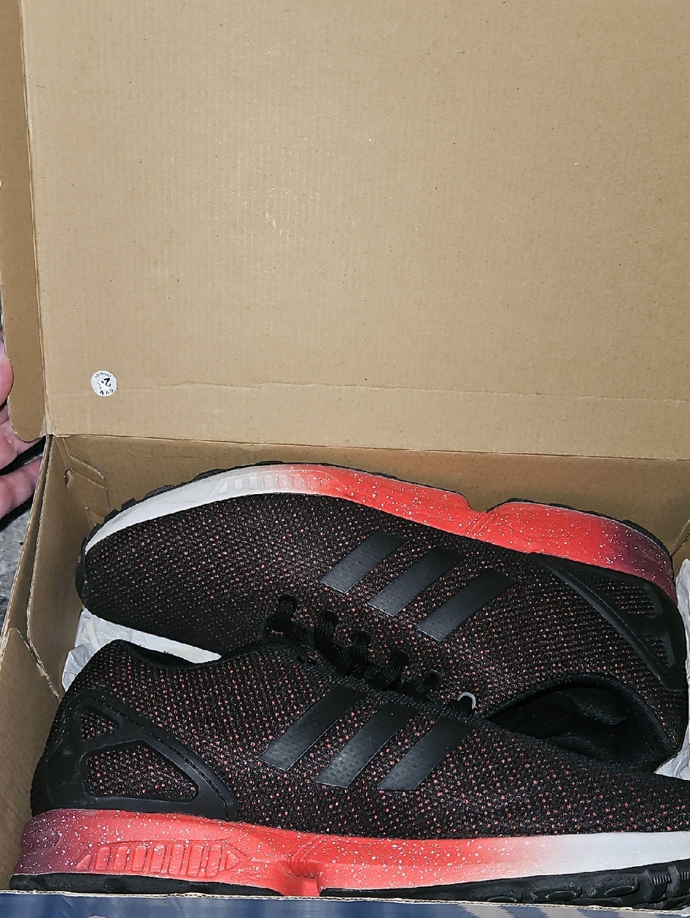 adidas Men’s Black and Red Gradient Sneakers